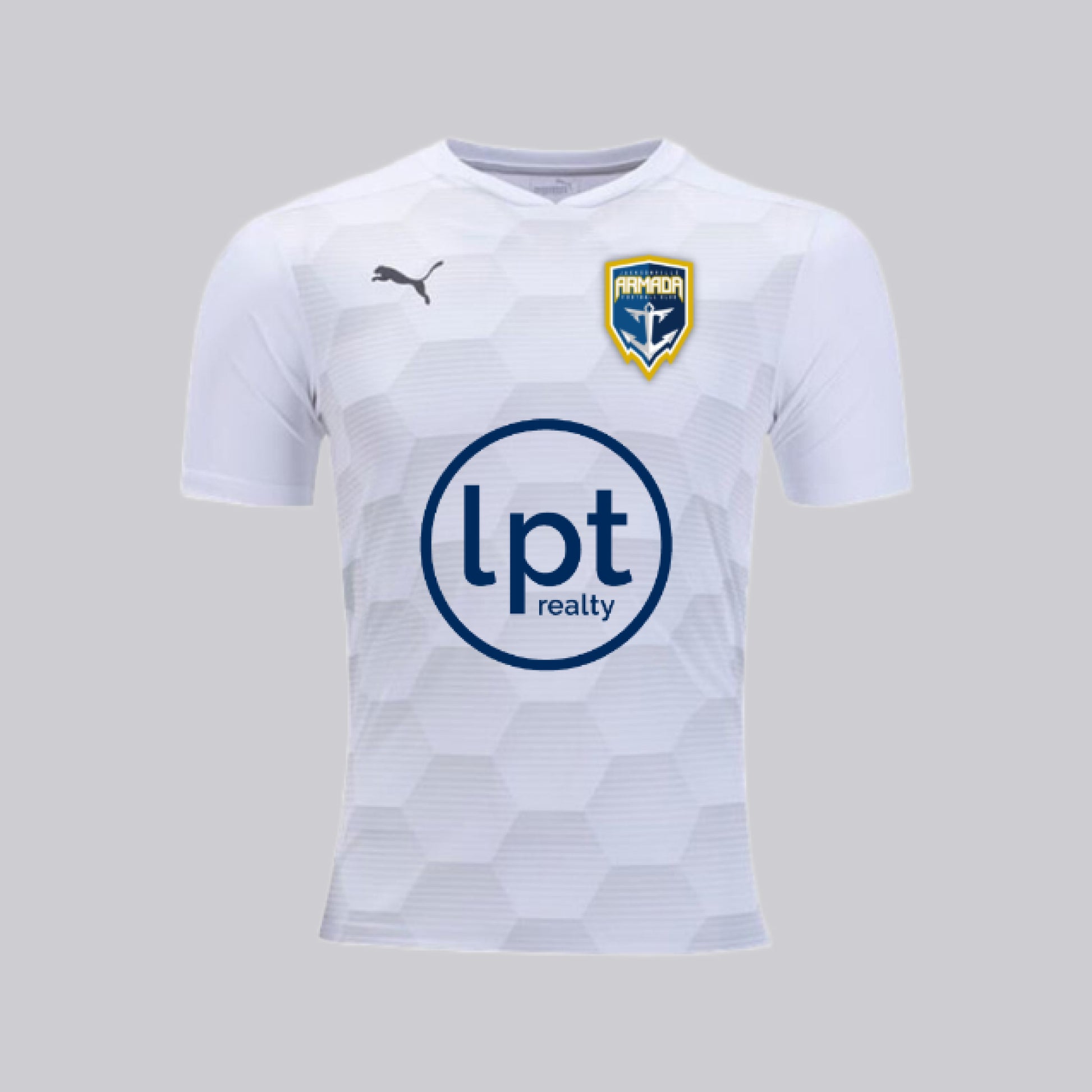 White slim-fit jersey with a honeycomb graphic pattern in gradient shades of gray on front panel. Features a slight v-neck, Armada’s signature crest logo on the upper left chest, PUMA’s gray cat logo on the upper right, and LPT Realty’s circle logo prominently displayed in navy in the mid-chest.